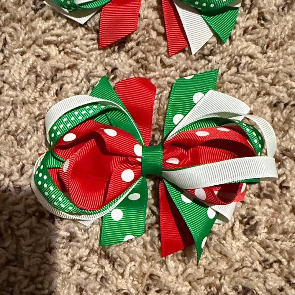 Girls 5 Christmas bows top bow is a custom Micky and Minnie Christmas bow